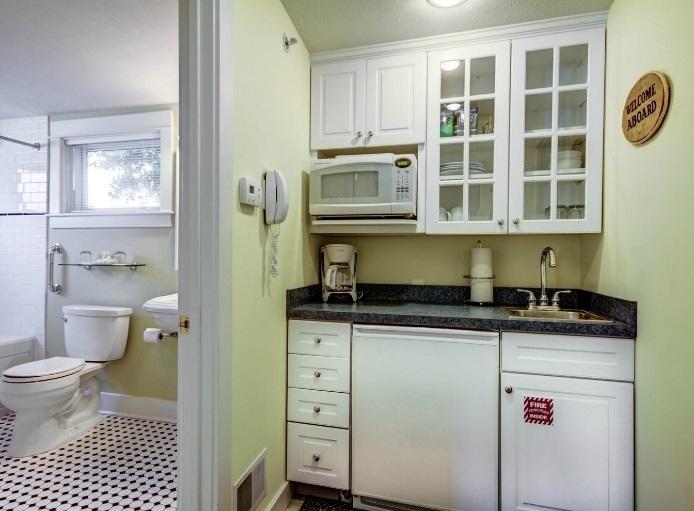Captain'S Cottage Suites Grand Haven Habitación foto